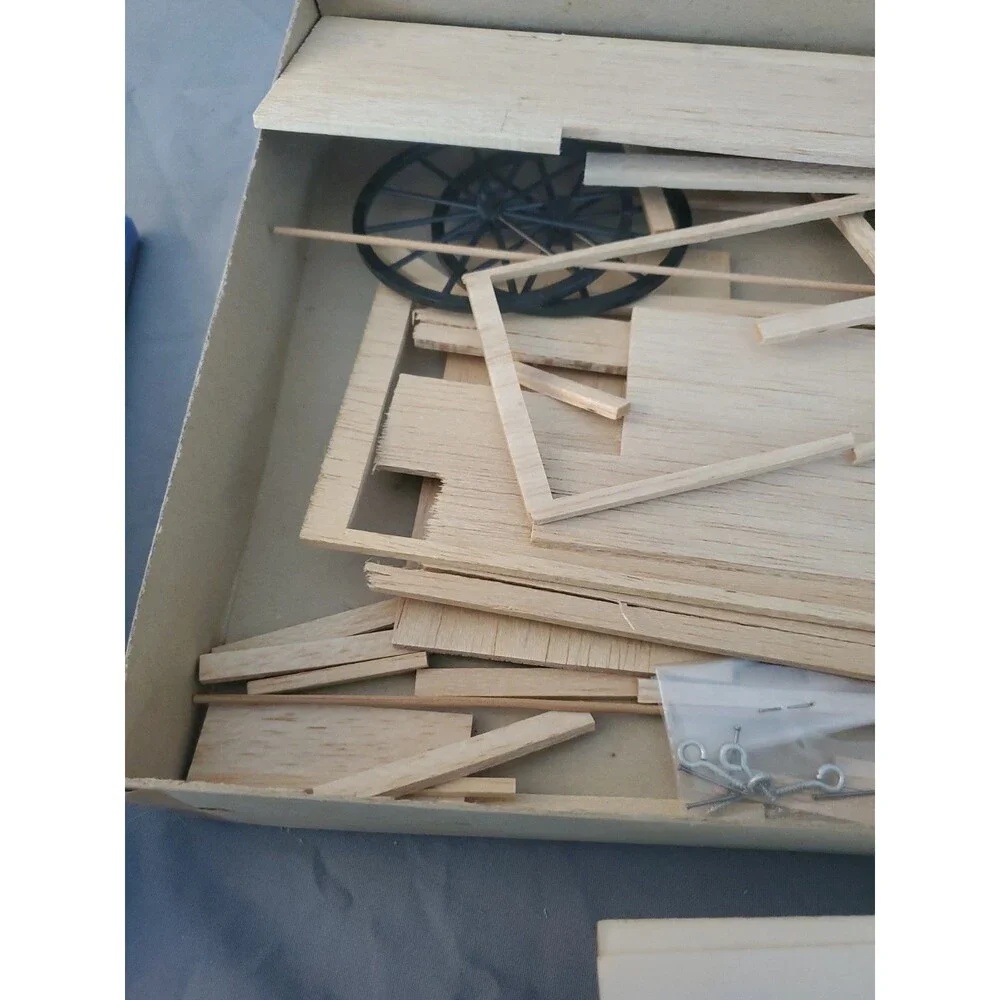 7 Vtg Wood Model Kit Lot Wooden Cover Wagon Log Cabin Sealed Read Gattling Buggy